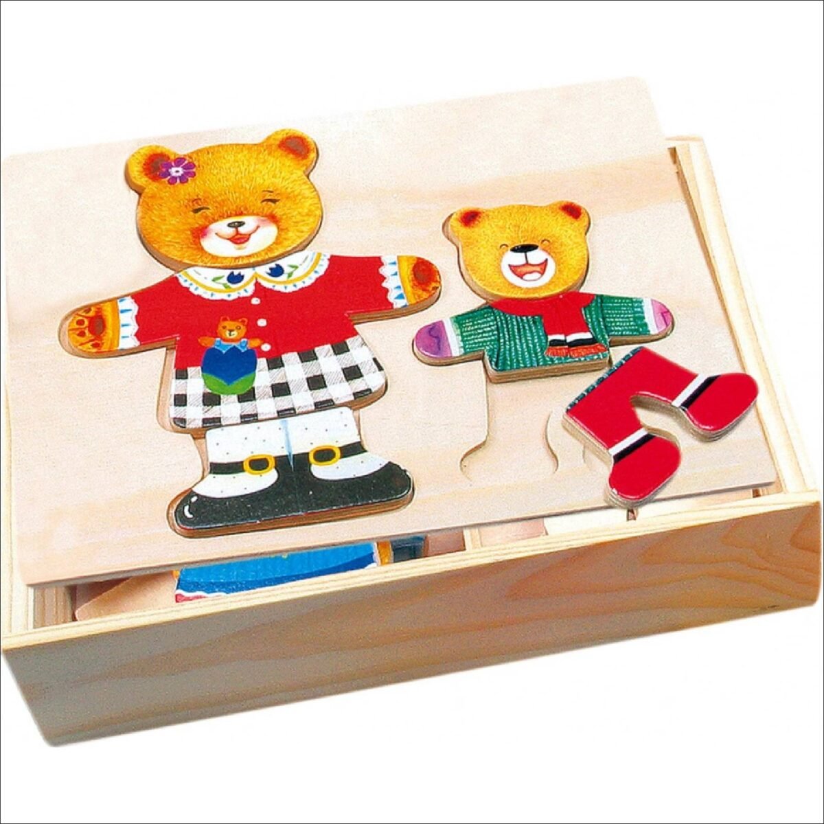 A popular wooden "dress-up" puzzle also called Wardrobe for small children with a little bear. Exchange the heads, bodies and legs of the figures with your children and combine clothes for different occasions. Total of 6 sets - 18 pieces.