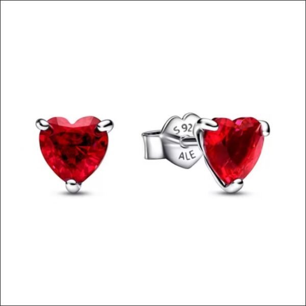 Pair of heart stud earrings made of 925 silver with red crystal from PANDORA;Paire de boucles d'oreilles coeur en argent 925 avec cristal rouge de PANDORA