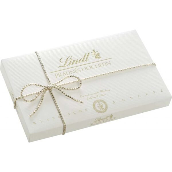 A selection of exquisite pralines made with the finest Lindt chocolate, filled with a variety of rich and smooth fillings, including hazelnut, cream, and fruit.