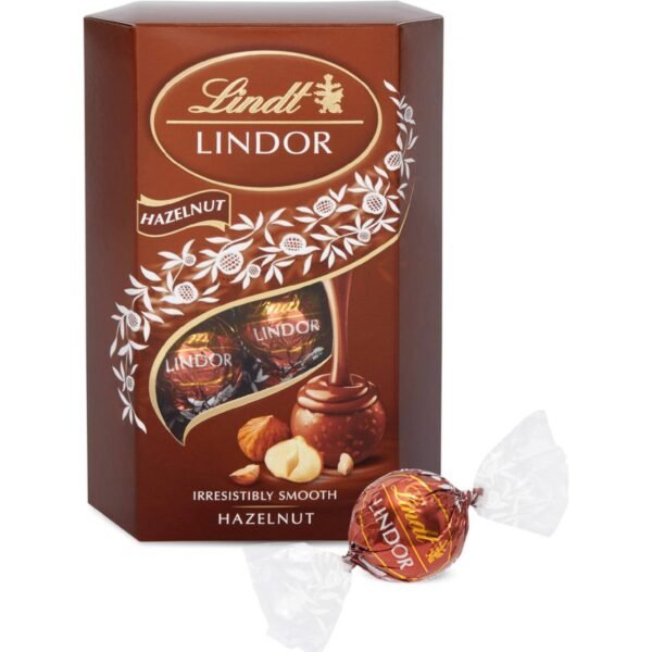 Lindt Lindor Hazelnut 200 g is a luxurious treat featuring smooth, velvety milk chocolate with a creamy hazelnut filling inside.
