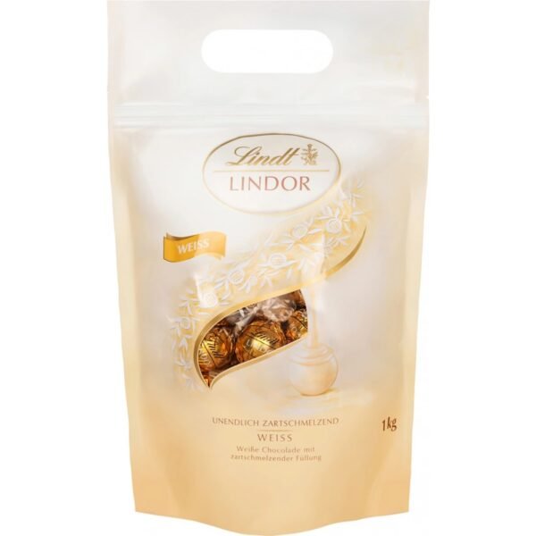 A luxurious assortment of smooth, creamy white chocolate truffles with a rich and velvety filling.