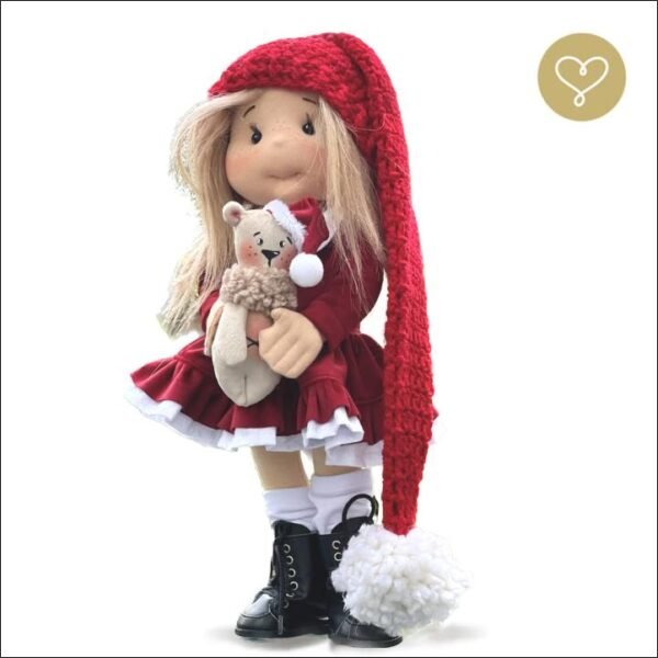 Saintie doll is a fabric doll about 38 cm tall, filled with certified OEKO-TEX® polyester wadding. It was created by a Polish handicraft company using only high-quality materials and ensuring safe play for children